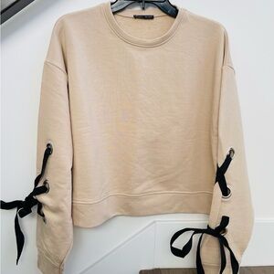 Zara Tan Sweatshirt with Black Ribbon and grommet tie accents on the sleeves, M